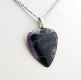 Black and White painted Pink guitar pick pendant.  One of a Kind