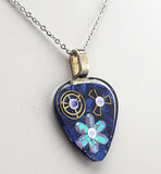 Blue Guitar Pick Pendant encased in Epoxy with Flowers and watch gears.  One of a kind