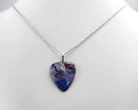 Metallic Purples and Blues painted guitar pick pendant.  One of a Kind