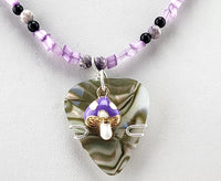Purple Mushroom Guitar Pick Necklace with Vintage 1905 Dressing gown beads.