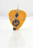 Orange Guitar Pick pendant with silver Treble Clef charm.