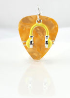 Orange Guitar Pick pendant with yellow headphones charm.