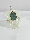 White Guitar Pick Pendant with green four-leaf clover charm