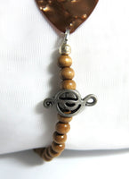 Guitar Pick Bracelet - Gold pick with wooden beads and a treble clef