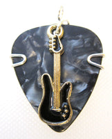Festival Wear Charm - Gray guitar pick with a black and gold charm
