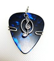 Guitar Pick Pendant with a blue guitar pick and silver treble clef charm