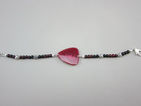 Coral Bracelet made with a handmade guitar pick and little silver hearts.  BBW Bracelet - made for the woman with the more powerful wrist!