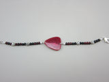 Coral Bracelet made with a handmade guitar pick and little silver hearts.  BBW Bracelet - made for the woman with the more powerful wrist!