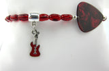 Guitar Jewelry Guitar Pick Bracelet - Red Pearloid Guitar Pick Bracelet with glass beads and a enamel guitar pick dangle charm.