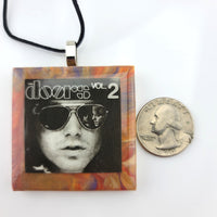 The Doors Jim Morrison Ceramic necklace made from AUTHENTIC album sleeve insert.  Wear a piece of music history.