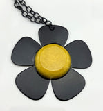Daisy Guitar Pick Necklace - Five Black Guitar Picks with Yellow center to create a daisy flower necklace.  Black metal chain included