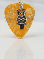 Orange Guitar Pick pendant with silver owl charm.