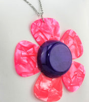 Daisy Guitar Pick Necklace - Five Hot Pink Guitar Picks with purple center to create a daisy flower necklace.